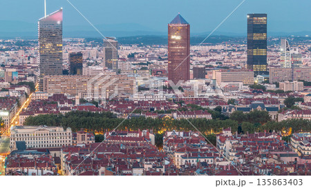 Panoramic aerial view of Lyon after sunset from Fourviere Hill day to night transition. France 135863403