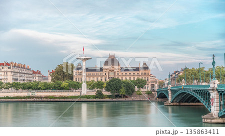 Panoramic hyperlapse view of the Rhone River and its embankment, featuring the University Jean-Moulin in Lyon, France. 135863411
