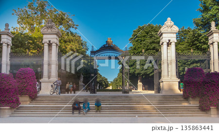 Entrance to Buen Retiro Park - one of largest parks in Madrid timelapse Entrance to Buen Retiro Park - one of largest parks in Madrid timelapse 135863441