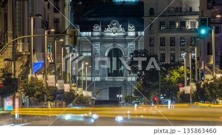 Rays of traffic lights timelapse on Gran via street in Madrid at night. Spain, Europe. Rays of traffic lights timelapse on Gran via street in Madrid at night. Spain, Europe. 135863460