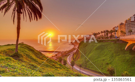 Aerial sunset view of Lima's Coastline in the neighborhood of Miraflores timelapse, Lima, Peru Aerial sunset view of Lima's Coastline in the neighborhood of Miraflores timelapse, Lima, Peru 135863561
