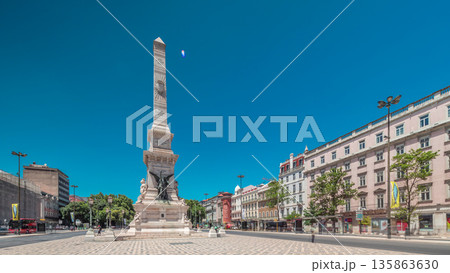 Restauradores Square in Lisbon timelapse hyperlapse. Monument to the Restorers and historical houses around Restauradores Square in Lisbon timelapse hyperlapse. Monument to the Restorers and historical houses around 135863630