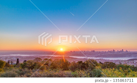 Colorful sunset on Bosphorus timelapse from Camlica hill with city skyline in Istanbul. Colorful sunset on Bosphorus timelapse from Camlica hill with city skyline in Istanbul. 135863711