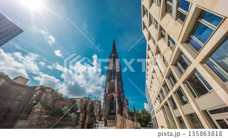 Looking up perspective to the facade of Ehemalige Hauptkirche St. Nikolai timelapse hyperlapse in Hamburg, Germany Looking up perspective to the facade of Ehemalige Hauptkirche St. Nikolai timelapse hyperlapse in Hamburg, Germany 135863818