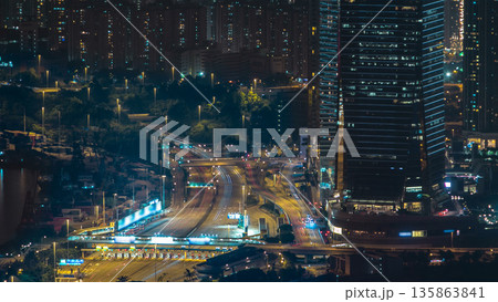 Hong Kong city skyline aerial timelapse at night with Victoria Harbor and skyscrapers 135863841