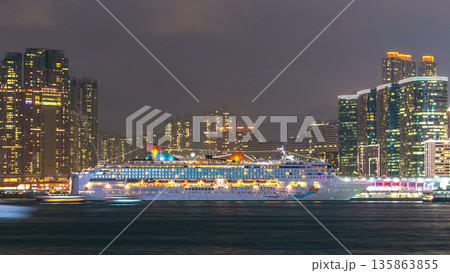 Skyline panorama timelapse day to night with towers and ship in West Kowloon, Hong Kong. 135863855