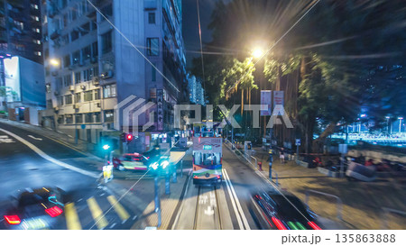View from double-decker tram on street of HK timelapse hyperlapse. View from double-decker tram on street of HK timelapse hyperlapse. 135863888