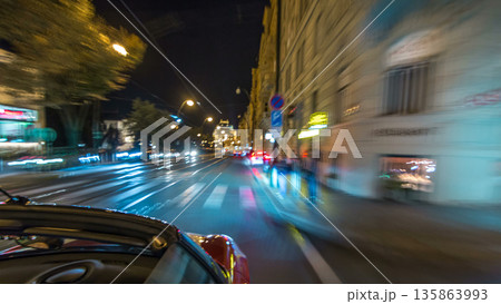 Car moves at fast speed at the night streets timelapse hyperlapse drivelapse. 135863993
