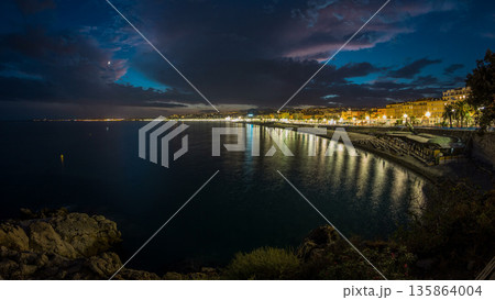 Waterfront of Nice city and Mediterranean Sea day to night timelapse Waterfront of Nice city and Mediterranean Sea day to night timelapse 135864004
