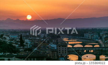 Skyline view of Arno River timelapse. Ponte Vecchio from Piazzale Michelangelo at Sunset, Florence, Italy. Skyline view of Arno River timelapse. Ponte Vecchio from Piazzale Michelangelo at Sunset, Florence, Italy. 135864022