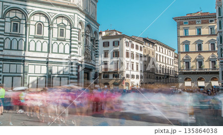Tourists near Florence Baptistery San Giovanni timelapse on Piazza San Giovanni. 135864038