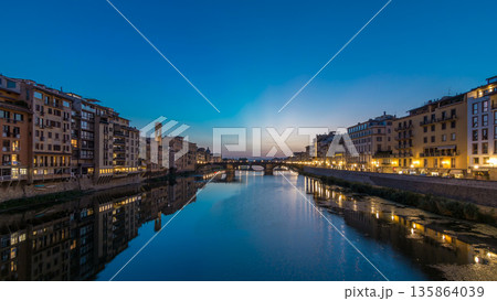 Ponte Santa Trinita Holy Trinity Bridge day to night timelapse over River Arno in Florence Ponte Santa Trinita Holy Trinity Bridge day to night timelapse over River Arno in Florence 135864039