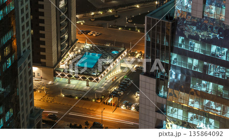 The skyline of the West Bay area from top in Doha timelapse, Qatar. The skyline of the West Bay area from top in Doha timelapse, Qatar. 135864092