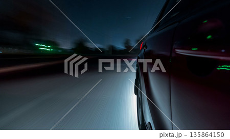 Drivelapse urban look from fast driving car at a night avenue in a city timelapse hyperlapse Drivelapse urban look from fast driving car at a night avenue in a city timelapse hyperlapse 135864150
