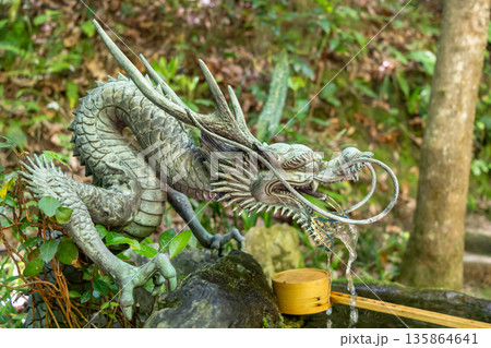 Bronze dragon chozuya at Mitaki-Dera temple in Hiroshima, Japan Bronze dragon chozuya at Mitaki-Dera temple in Hiroshima, Japan 135864641