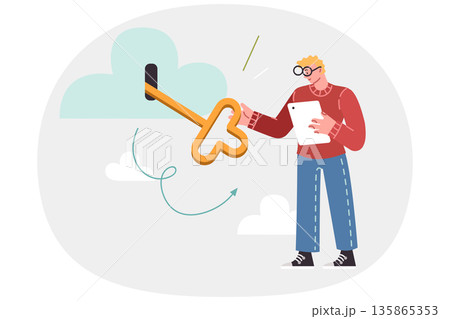 Man uses cloud technologies to store and process data, holds large key in hands to gain access 135865353