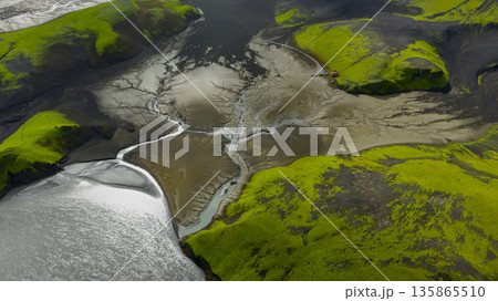 Aerial View of Iceland's Moss Covered Hills and Braided Rivers 135865510