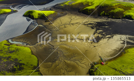 Aerial View of Iceland's Volcanic Landscape with Braided Rivers Aerial View of Iceland's Volcanic Landscape with Braided Rivers 135865513