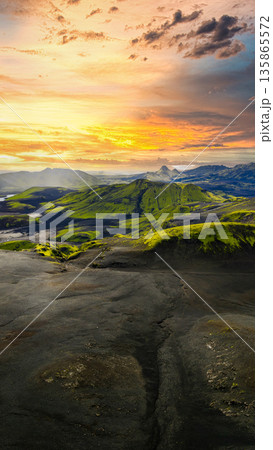 Aerial View of Iceland's Volcanic Landscape with River and Sunset Aerial View of Iceland's Volcanic Landscape with River and Sunset 135865572