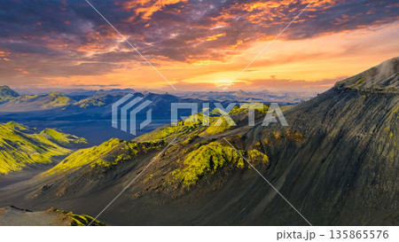 Volcanic Landscape in Iceland at Sunset with Moss Covered Slopes Volcanic Landscape in Iceland at Sunset with Moss Covered Slopes 135865576