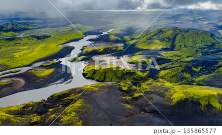 Aerial View of Iceland's Volcanic Landscape with Winding River Aerial View of Iceland's Volcanic Landscape with Winding River 135865577