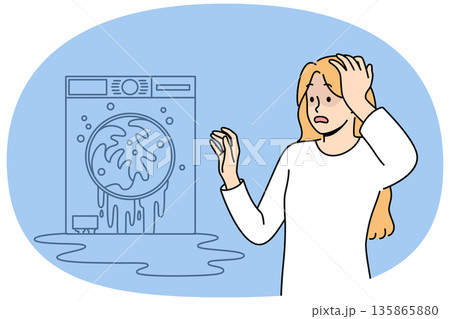 Broken washing machine shocks housewife who needs help of household appliance repairman Broken washing machine shocks housewife who needs help of household appliance repairman 135865880