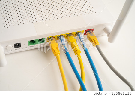 Ethernet cable with wireless router connect to internet service provider network. 135866119