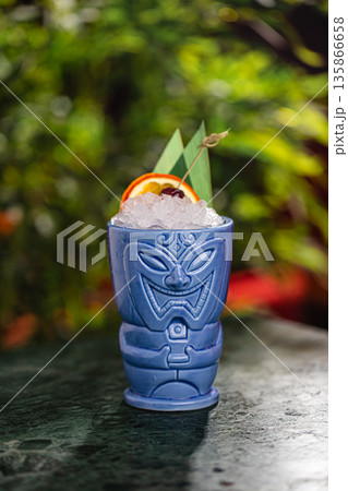 Tiki style cocktail in ceramic mug Tiki style cocktail in ceramic mug 135866658