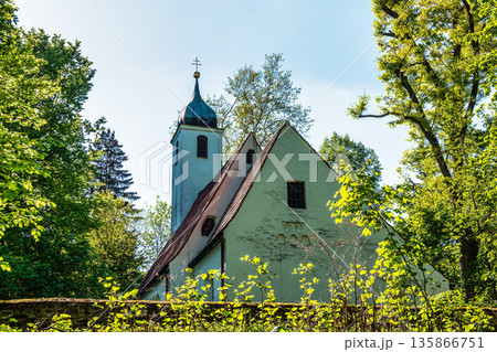 Church St.Clemens in Kranzberg near Freising, Bavaria with ancient graveyard and beautiful old wrought iron crosses 135866751
