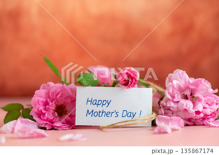 Minimalistic background of roses petals and the inscription thank you Minimalistic background of roses petals and the inscription thank you 135867174