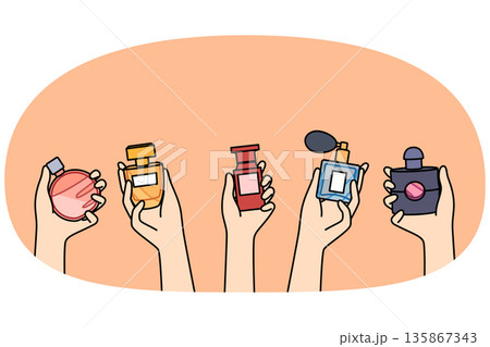 Bottles of perfume in hands of women choosing new scent to create desired look when going to party Bottles of perfume in hands of women choosing new scent to create desired look when going to party 135867343