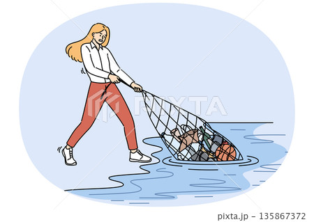 Woman eco activist pulls trash out of ocean as tries to tackle problem of environmental pollution Woman eco activist pulls trash out of ocean as tries to tackle problem of environmental pollution 135867372