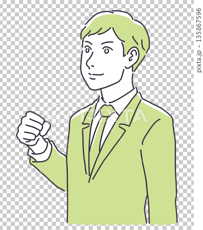 A man in a suit clenching his fist 135867596