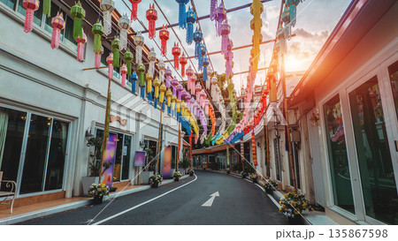 Colorful paper lanterns hanging over asian street alley, vibrant multicolor festival lanterns above narrow old town alleyway, Bangkok Thailand 135867598