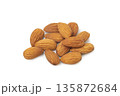 Heap of Dry roasted Almonds isolated on white background 135872684