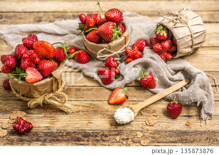 arrangement with fresh strawberries on wooden background arrangement with fresh strawberries on wooden background 135873876