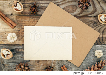 Blank paper, concert, cones and spices on a wooden background, flat lay. Blank paper, concert, cones and spices on a wooden background, flat lay. 135874047