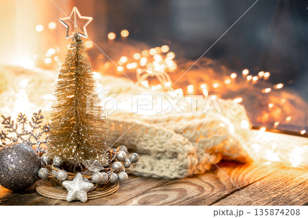 Christmas background with decorative fir tree on blurred background with bokeh. 135874208