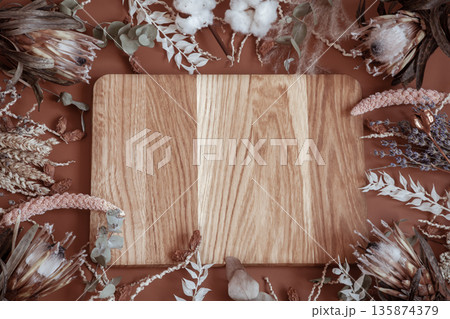 Floral arrangement with dry wildflowers and wooden element copy space. Floral arrangement with dry wildflowers and wooden element copy space. 135874379
