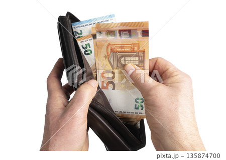 a wallet with some euro banknotes a wallet with some euro banknotes 135874700