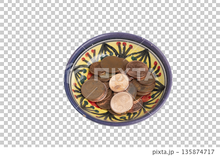 a bowl decorated with some euro coins a bowl decorated with some euro coins 135874717