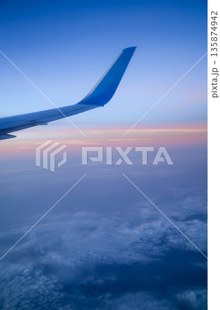 shooting from an airplane window shooting from an airplane window 135874942