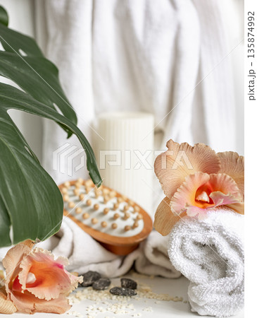 Spa composition with bath accessories and Thai orchid flowers. Spa composition with bath accessories and Thai orchid flowers. 135874992