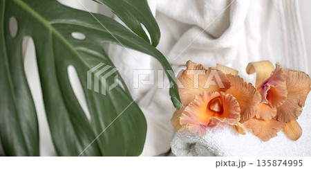 Spa composition with bath accessories and Thai orchid flowers. Spa composition with bath accessories and Thai orchid flowers. 135874995