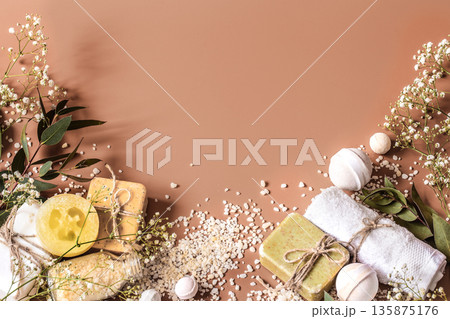 Spa concept with body and face accessories on colored background. Place for text Spa concept with body and face accessories on colored background. Place for text 135875176