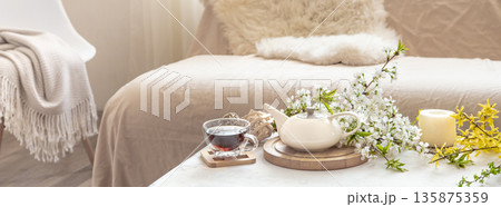 Composition with spring flowers in the interior. Composition with spring flowers in the interior. 135875359