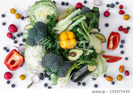 Vegetables and fruits, flat lay isolated on white background. Vegetables and fruits, flat lay isolated on white background. 135875430