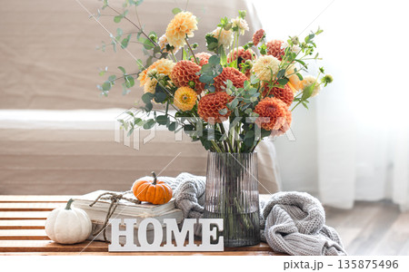 Autumn background with a bouquet of chrysanthemums and pumpkins, copy space. 135875496