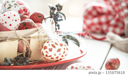 Easter eggs in basket 135875618