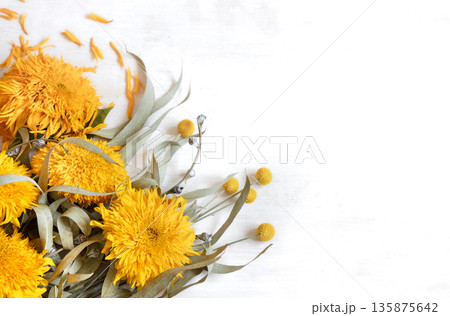 Autumn flat lay composition with sunflowers on a white background. 135875642